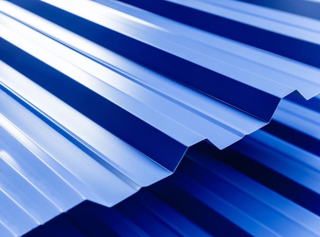 Blue metallic roof tiles background with drops of water