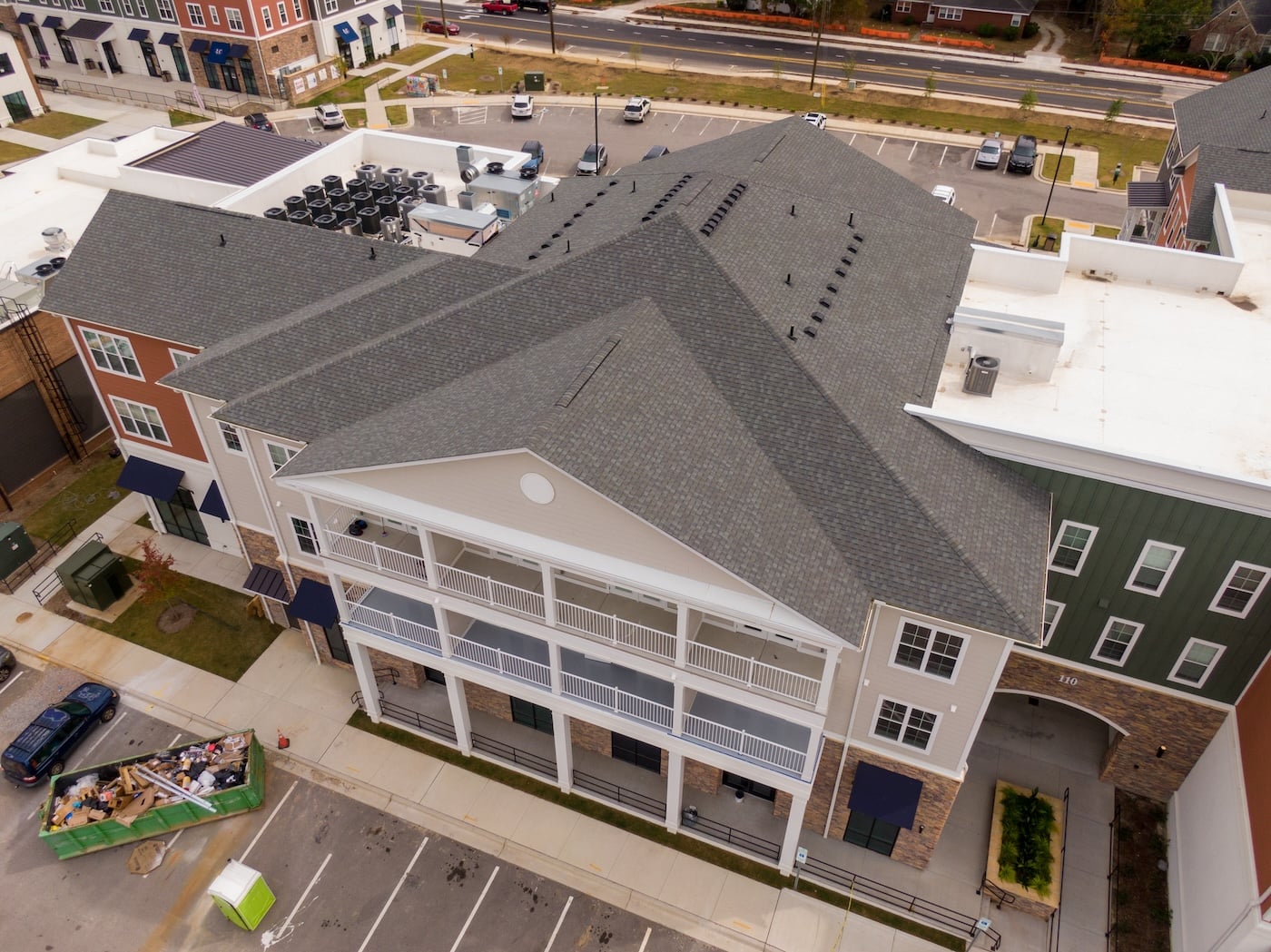 aerial view of shingle roof on apartment building
