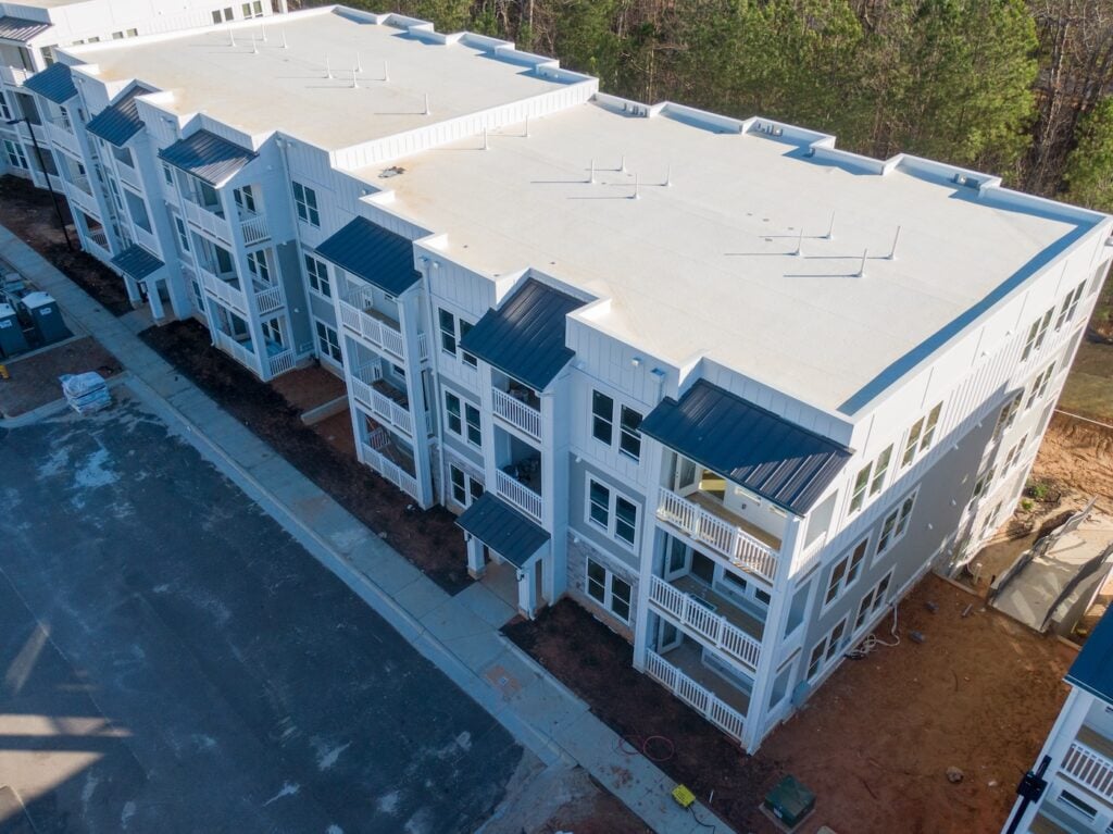 aerial view of pvc roof on apartment building