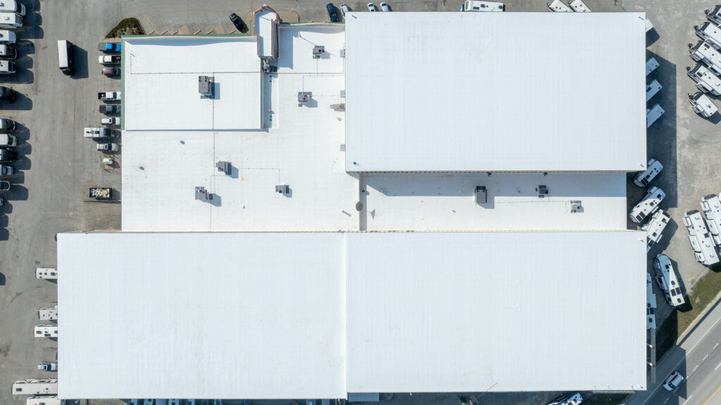 Drone view of a white flat roof