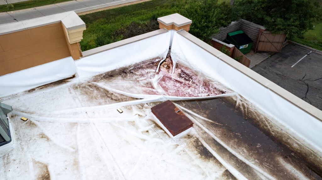 flat roof replacement tpo damaged