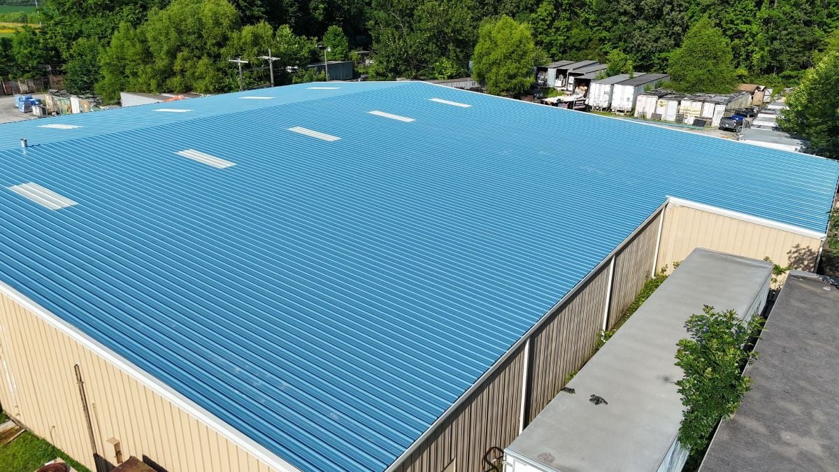 huge commercial building with metallic roof