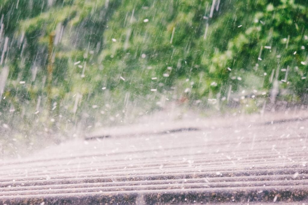hail storm on top of metallic roof